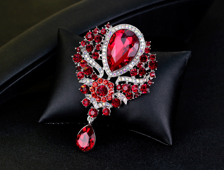 Rhinestone Alloy Floral Brooch with Glass Pendant