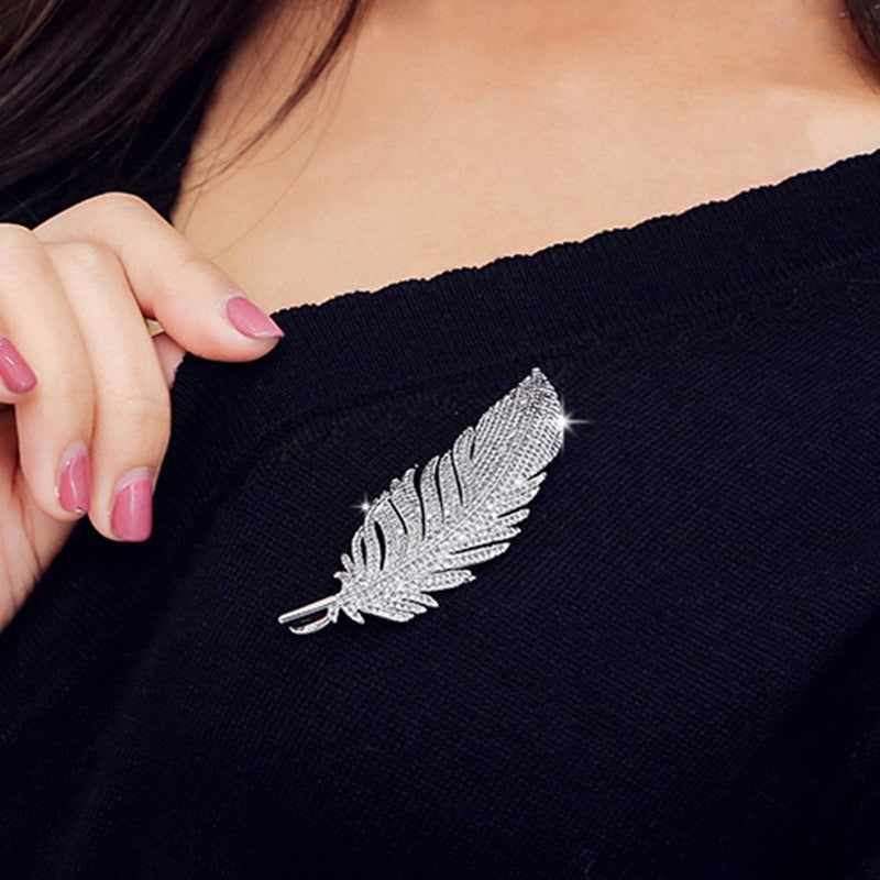 Radiant Feather Crystal Brooch — Elegance in Every Sparkle